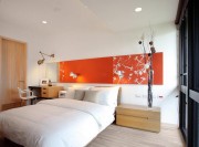 个性休闲现代简约风格50平米公寓卧室背景墙装修效果图